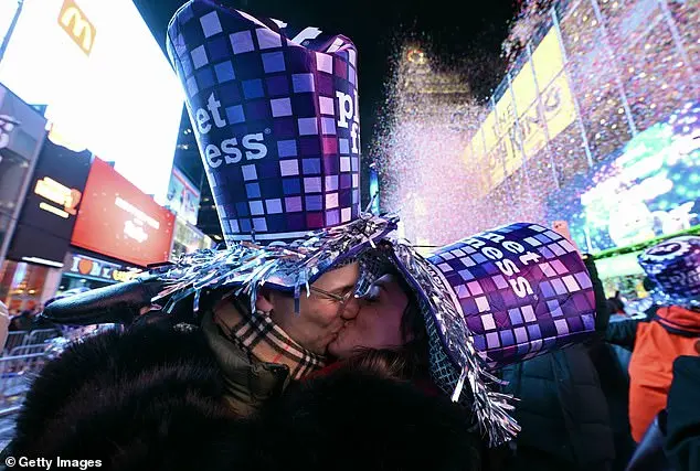 Thousands Gather in Times Square for New Year's Eve Celebration as 2025 Begins