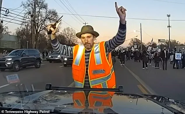 Dashboard Footage Contradicts Claims of Protester Being Struck in Memphis, Showing Activist Grabbing Police Vehicle