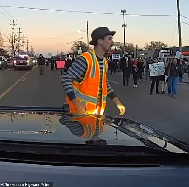 Dashboard Footage Contradicts Claims of Protester Being Struck in Memphis, Showing Activist Grabbing Police Vehicle