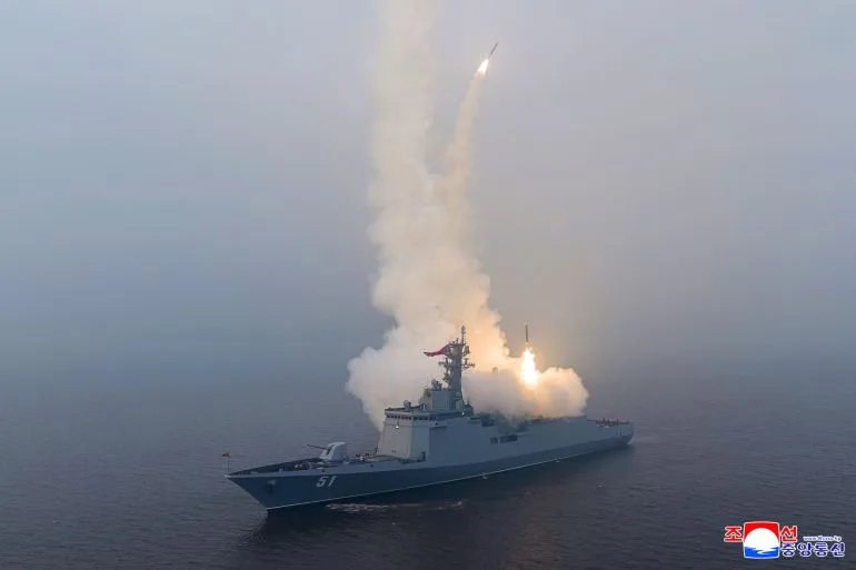 North Korea's Kim Jong Un personally oversees strategic missile test from new naval destroyer, underscoring military ambitions and political message