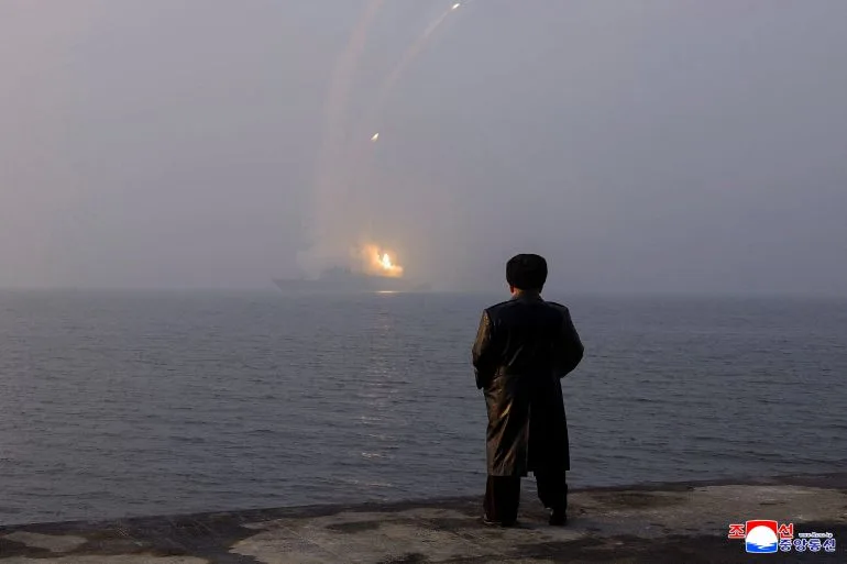 North Korea's Kim Jong Un personally oversees strategic missile test from new naval destroyer, underscoring military ambitions and political message